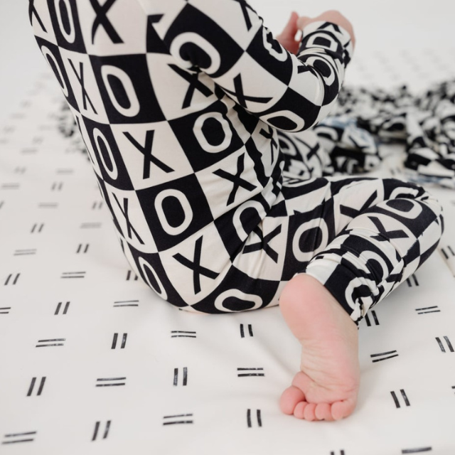 XOXO bamboo fold-over zip sleeper  |  Designed by Britt Horton